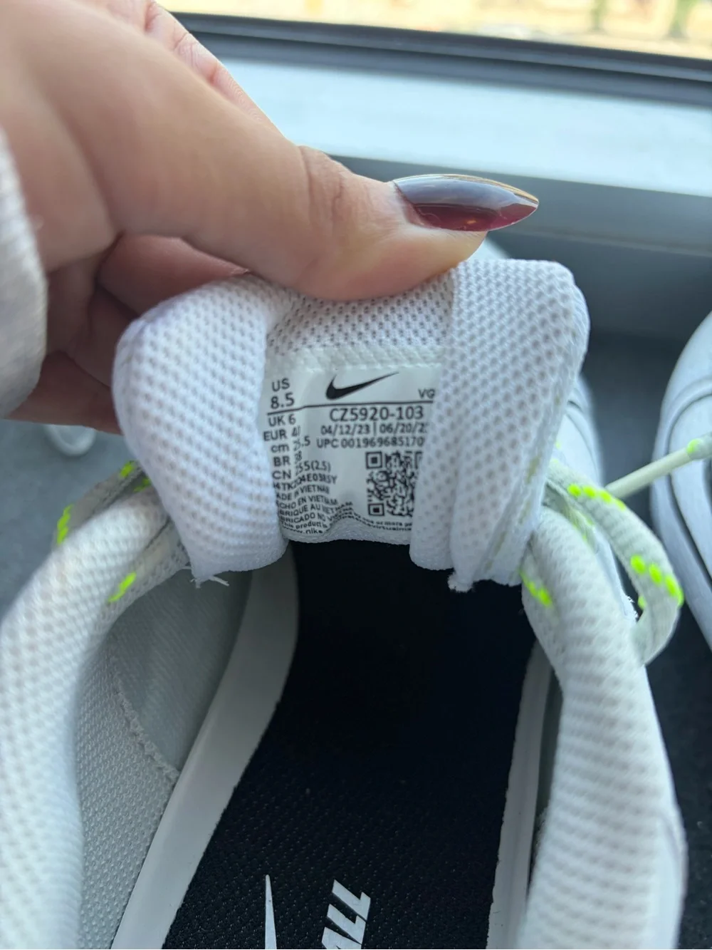 Nike Renew Softball Cleats with Black Swoosh and Neon Green Laces